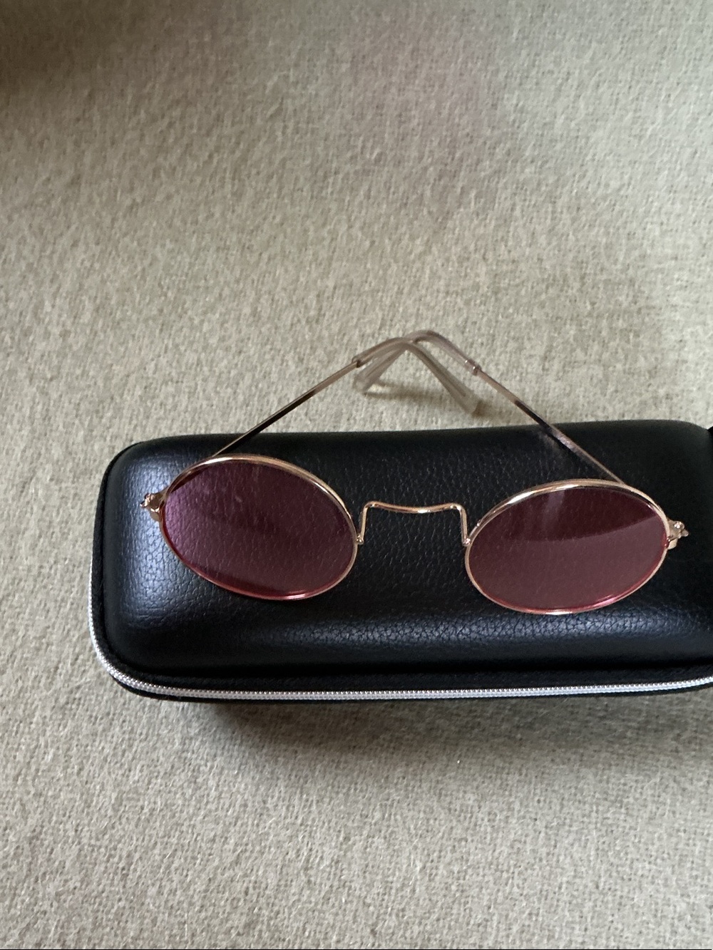 Oval Gold Frame Sunglasses with Rose-Tinted Lenses